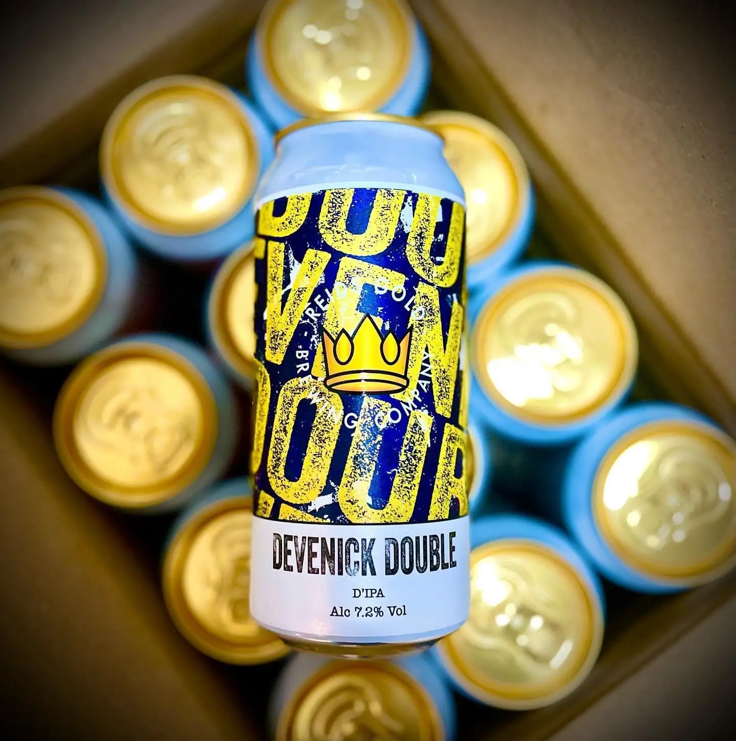 A can of Devenick Double D'IPA, 7.2% ABV, standing in an open case of cans